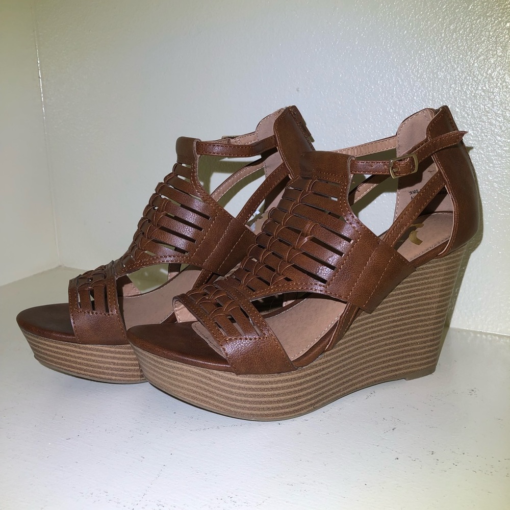 Woman’s brown wedges